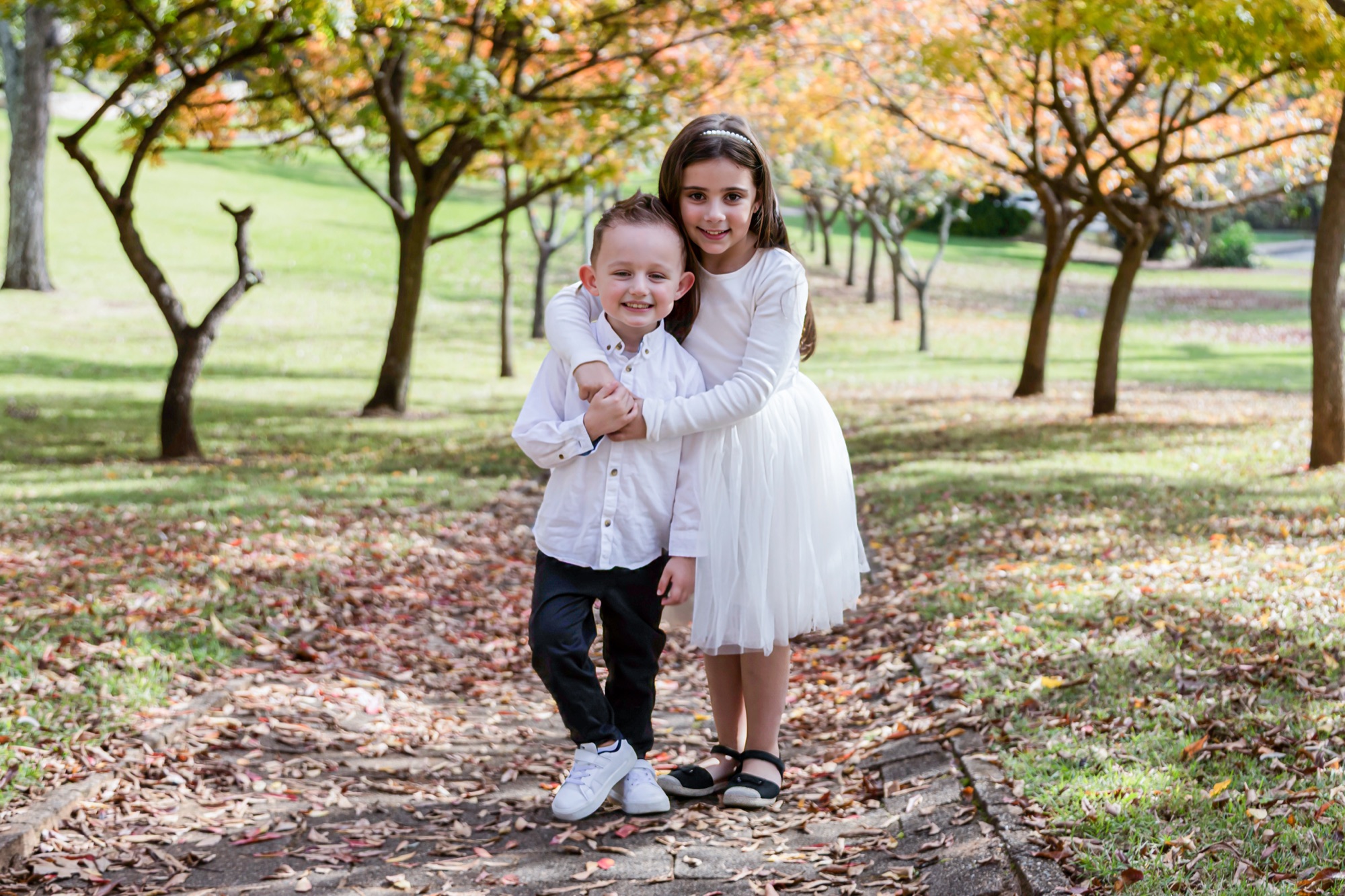 Relaxed family portrait in Sydney showcasing creative family photoshoot ideas by Faithful Photography